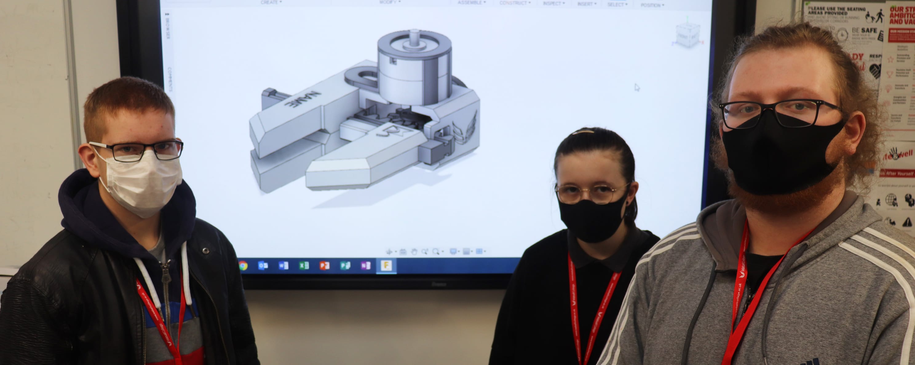 Walsall College Students in front of interactive whiteboard.