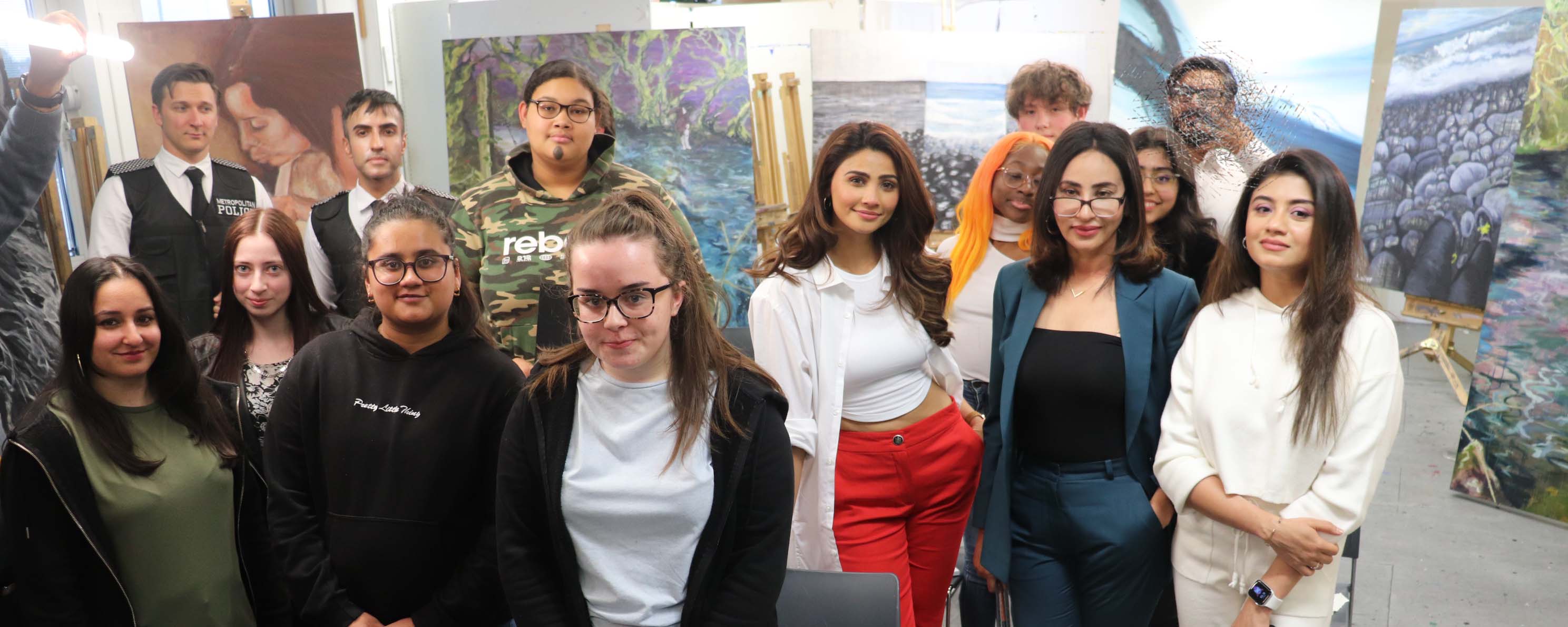 students with bollywood actresses group shot facing