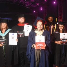 2020 and 2021 higher education students of the year group shot with principal