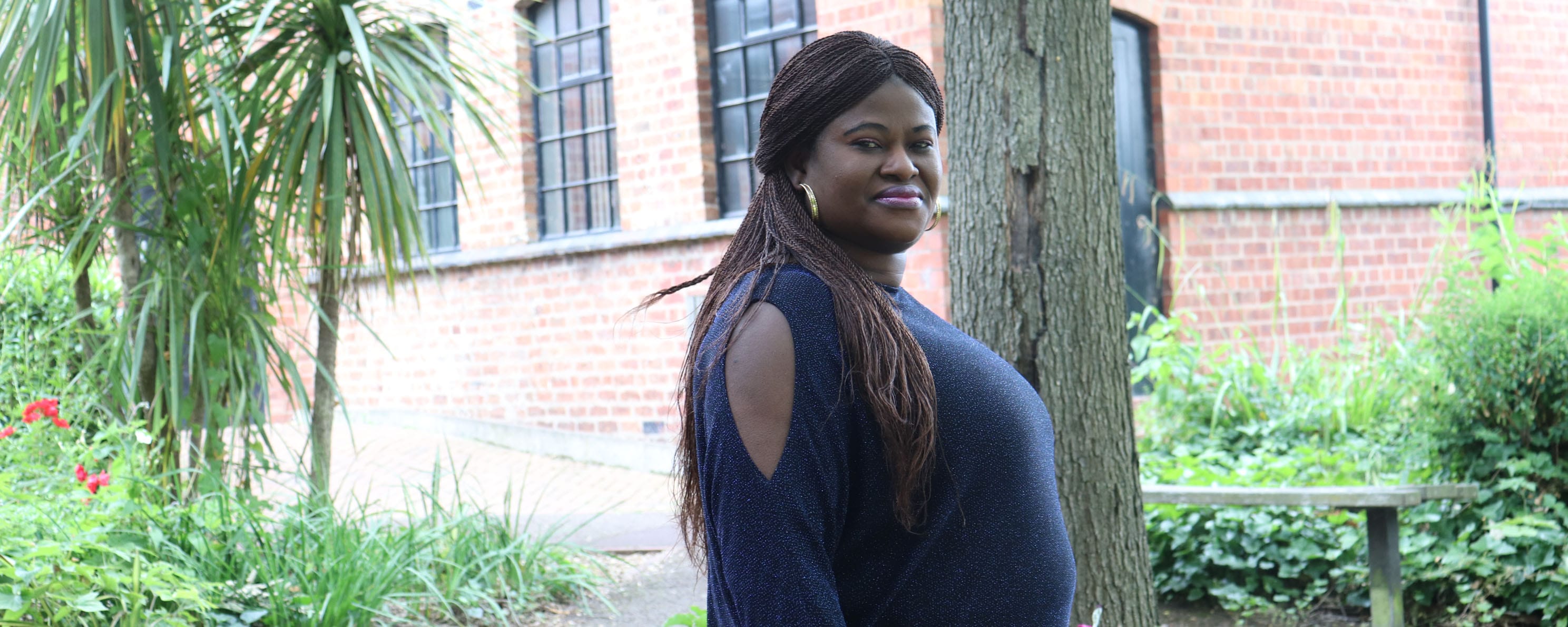 adult female student outside campus facing