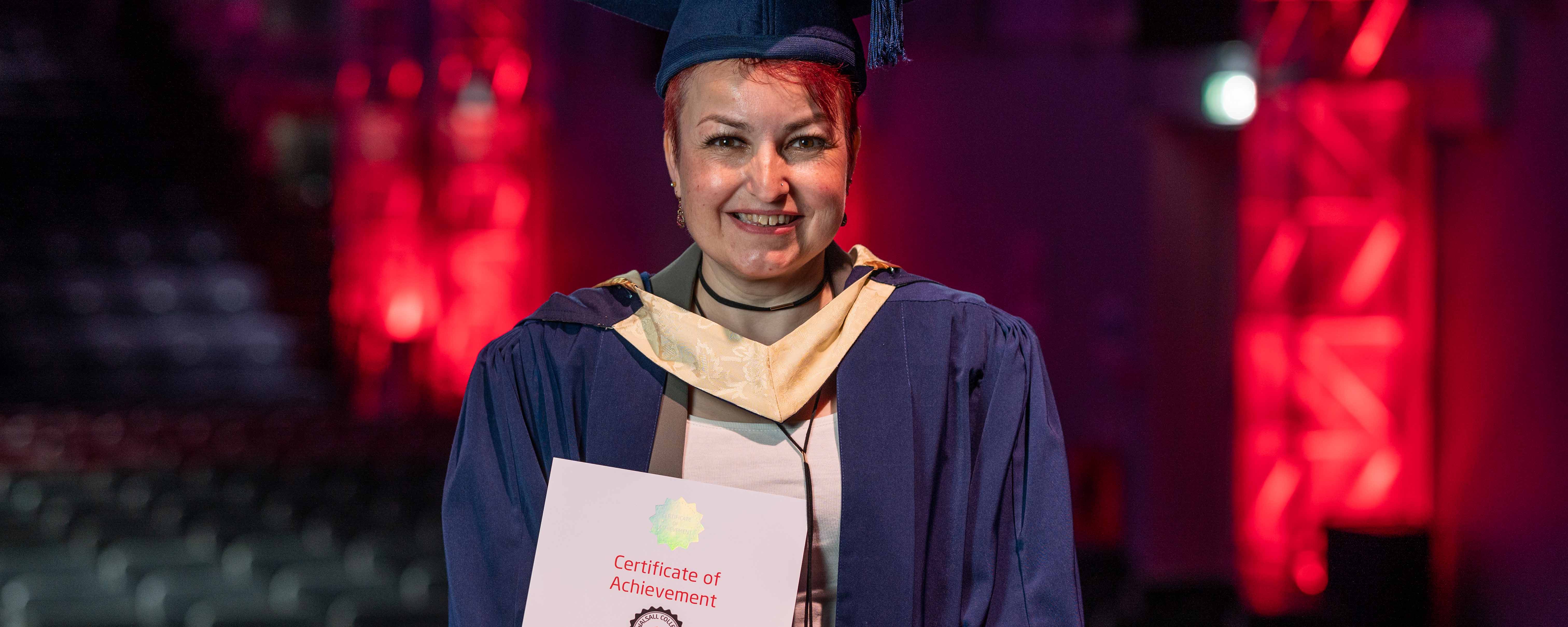 female higher education student at graduation