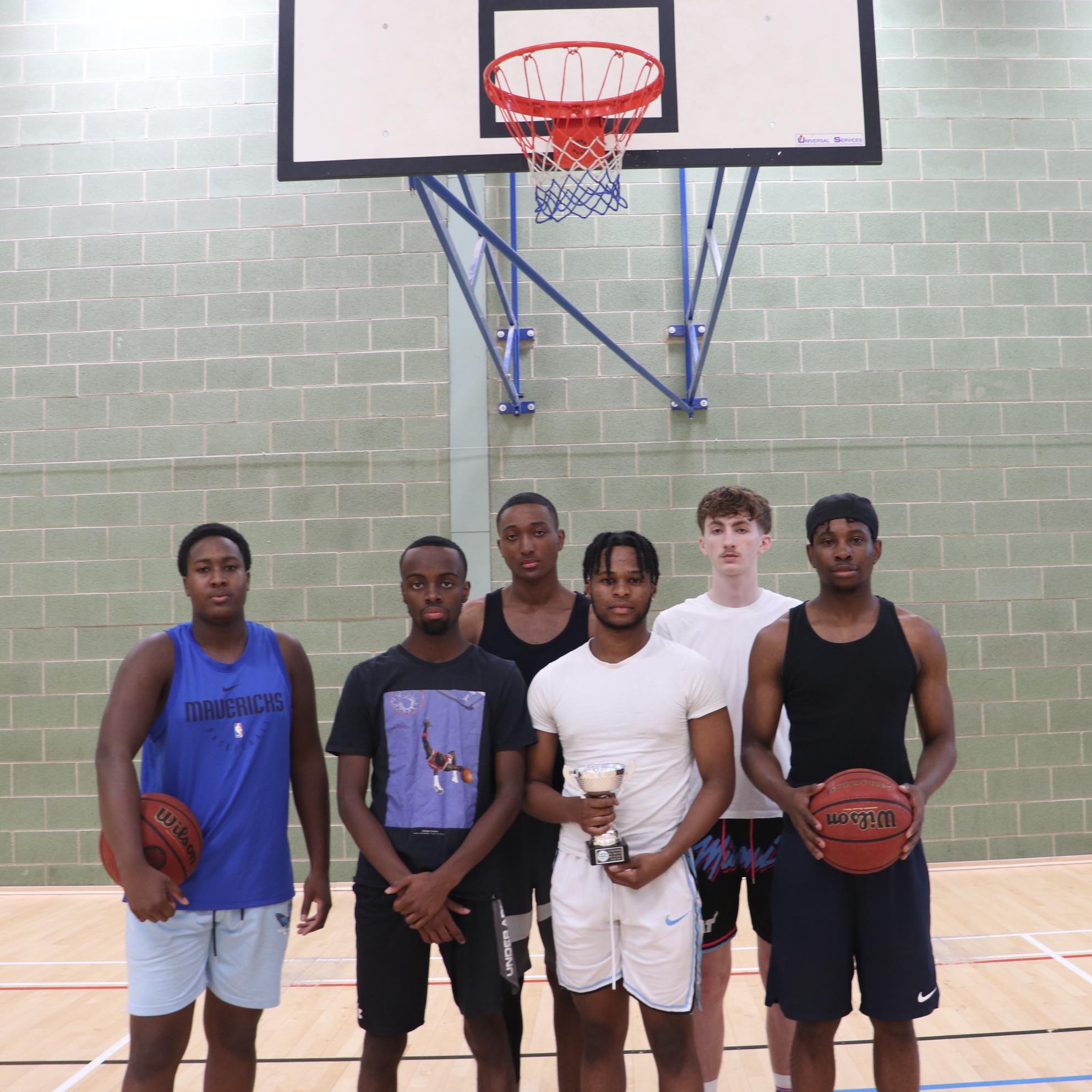 basketballers group shot court facing