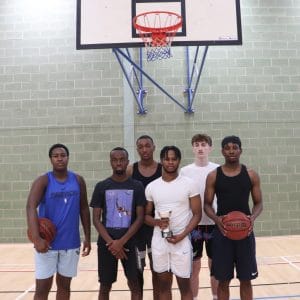 basketballers group shot court facing