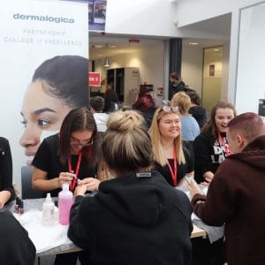 beauty students carry out nail treatments
