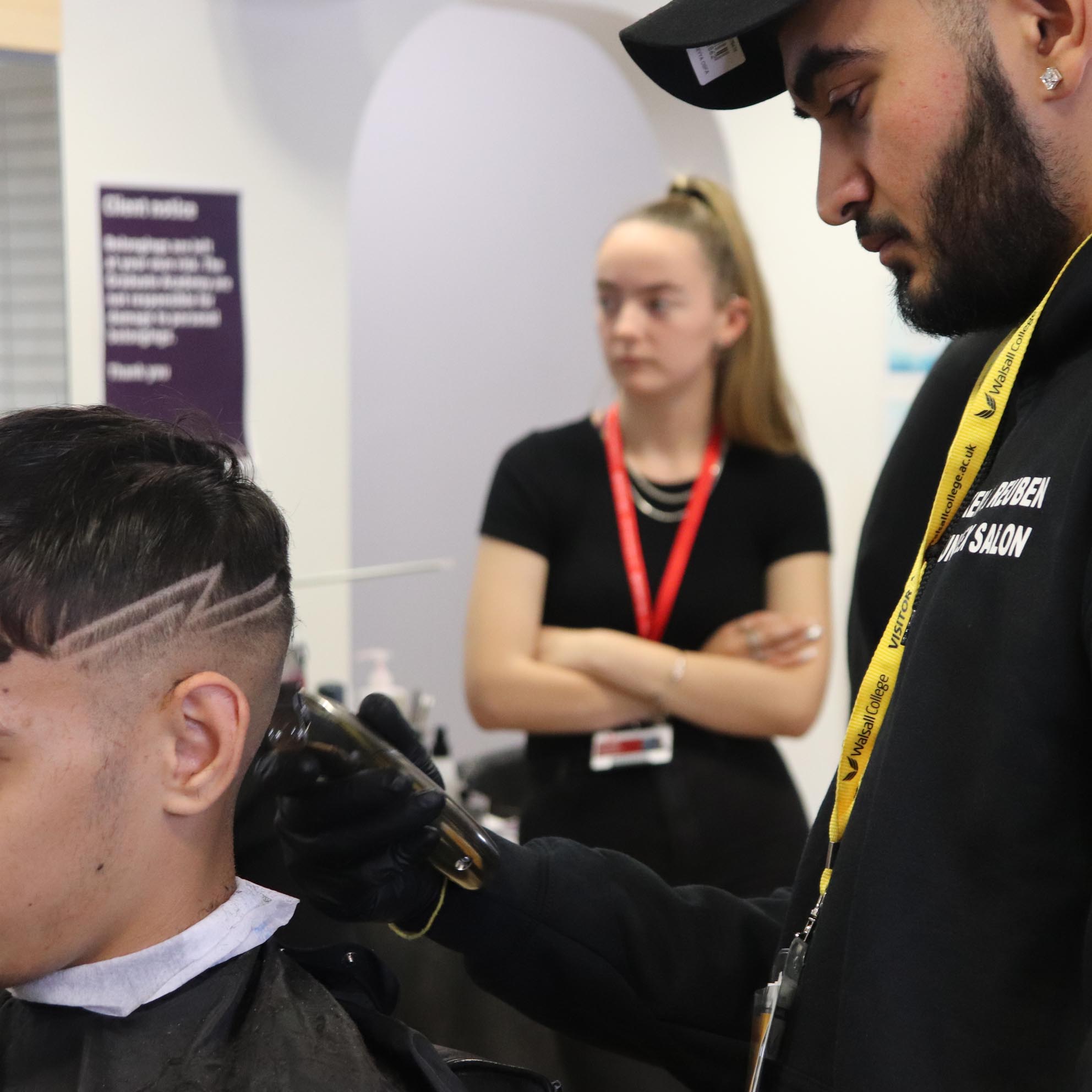 barber using razor on client