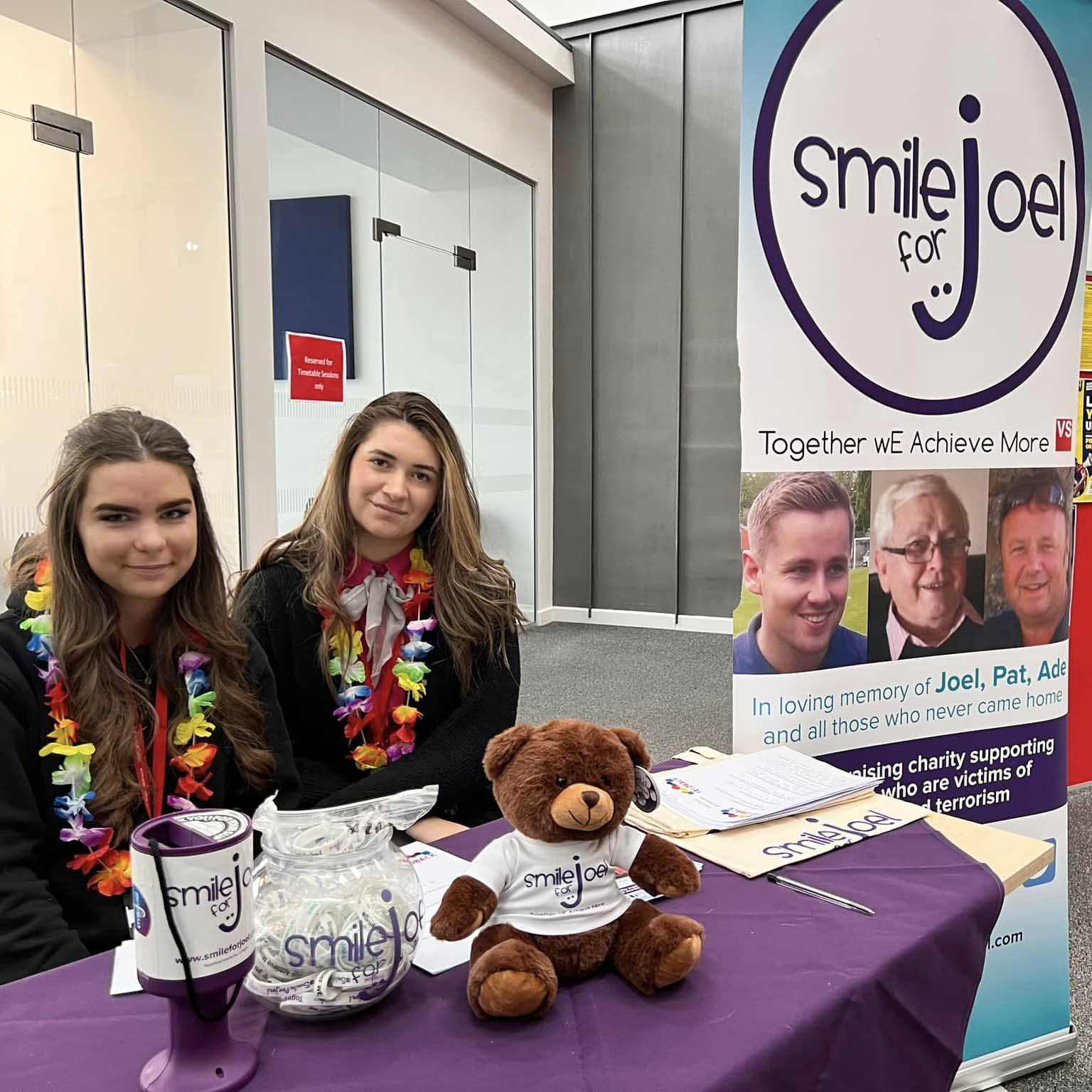 travel students host event facing