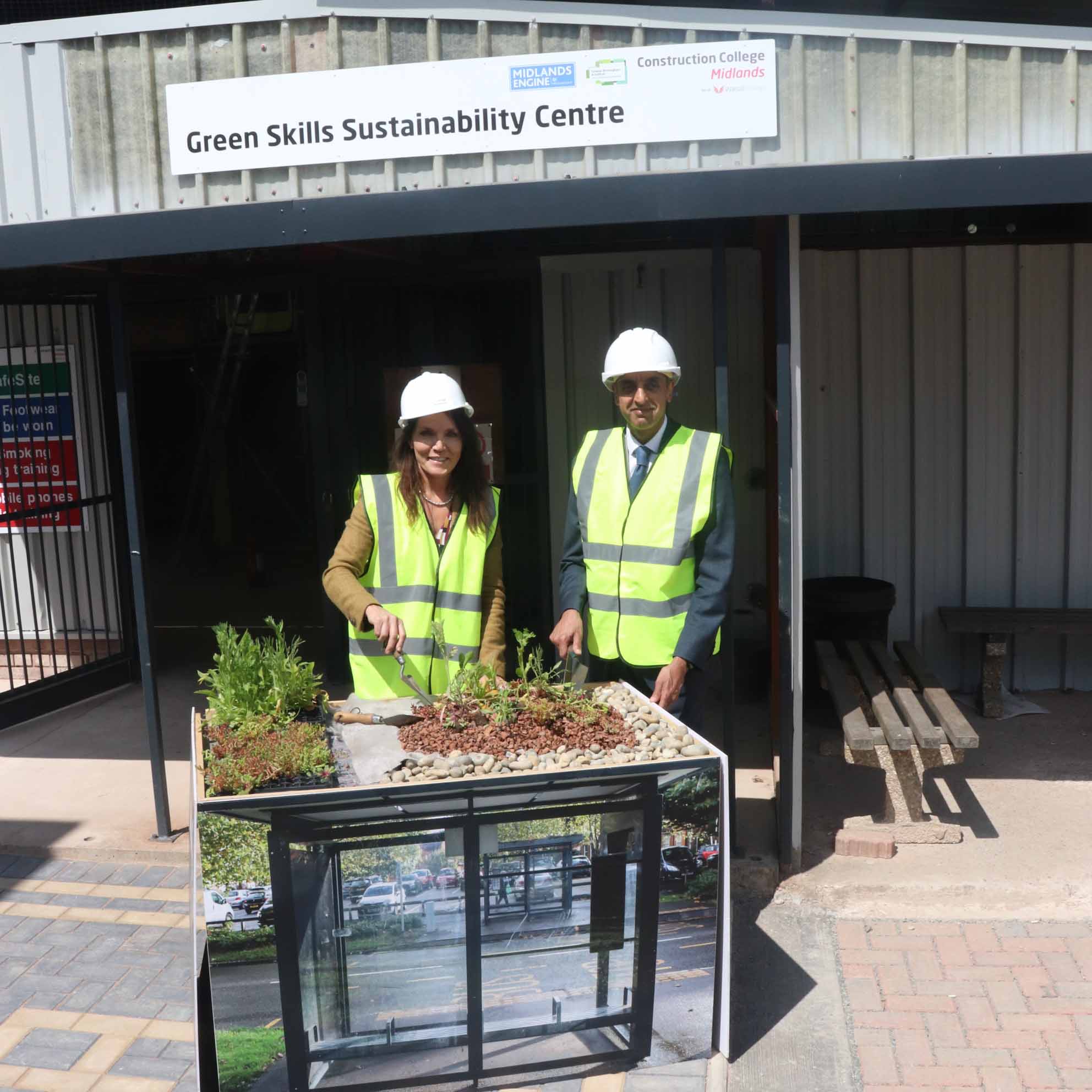David Wheeler, Henriette Breukelaar and Jatinder Sharma facing outside sustainability centre
