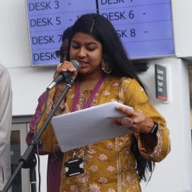 Student's Union President addresses students on stage