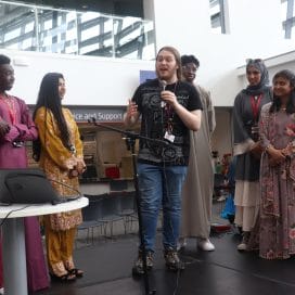 Student's Union Deputy President addresses students on stage