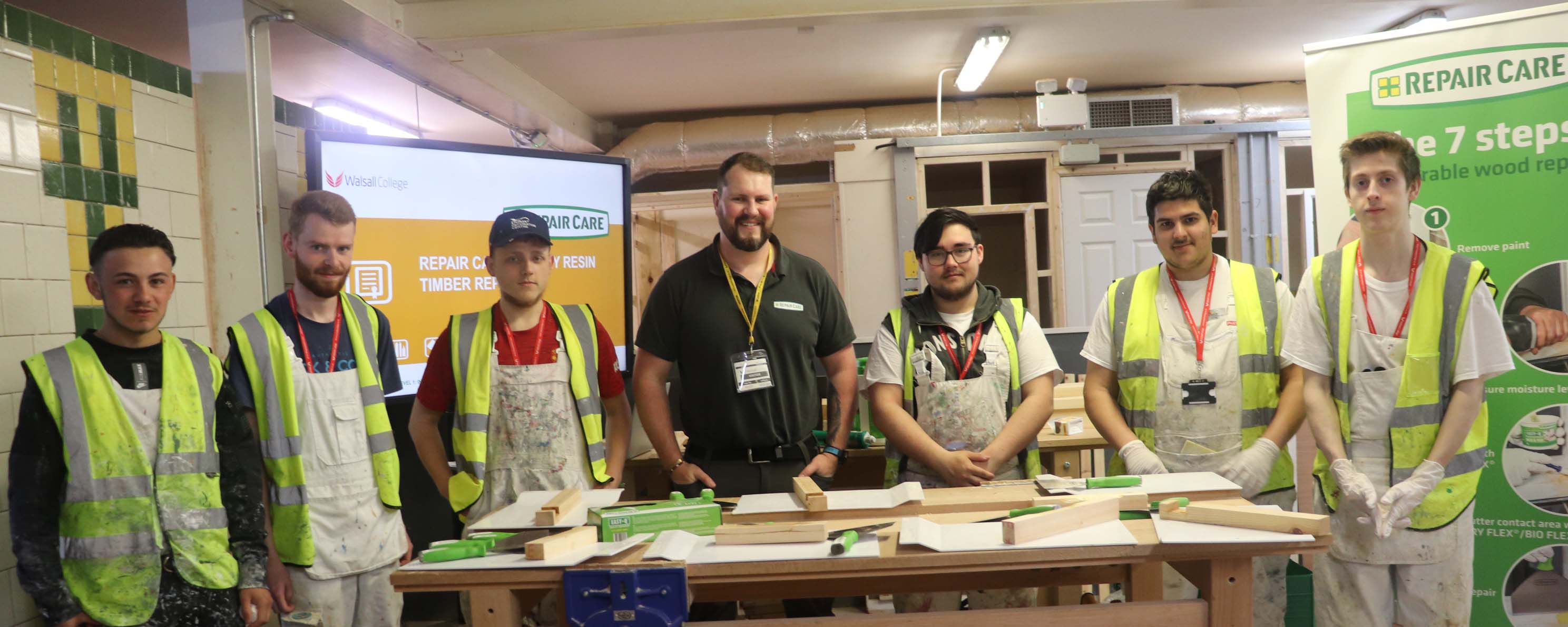 Painting and decorating students with James Lester, Repair Care International