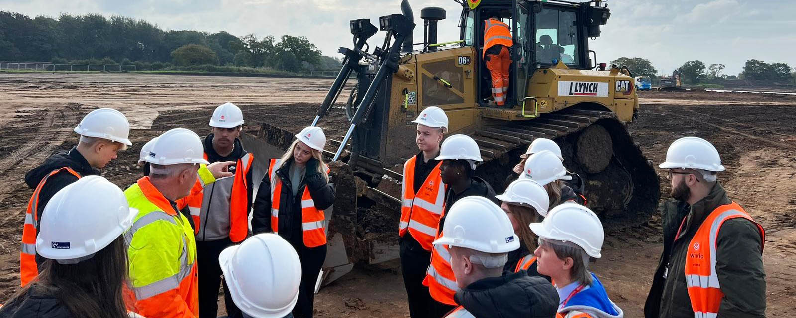 students on building site tour