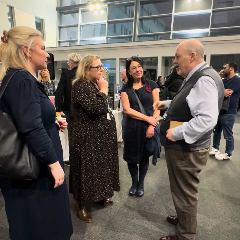 group of people in conversation