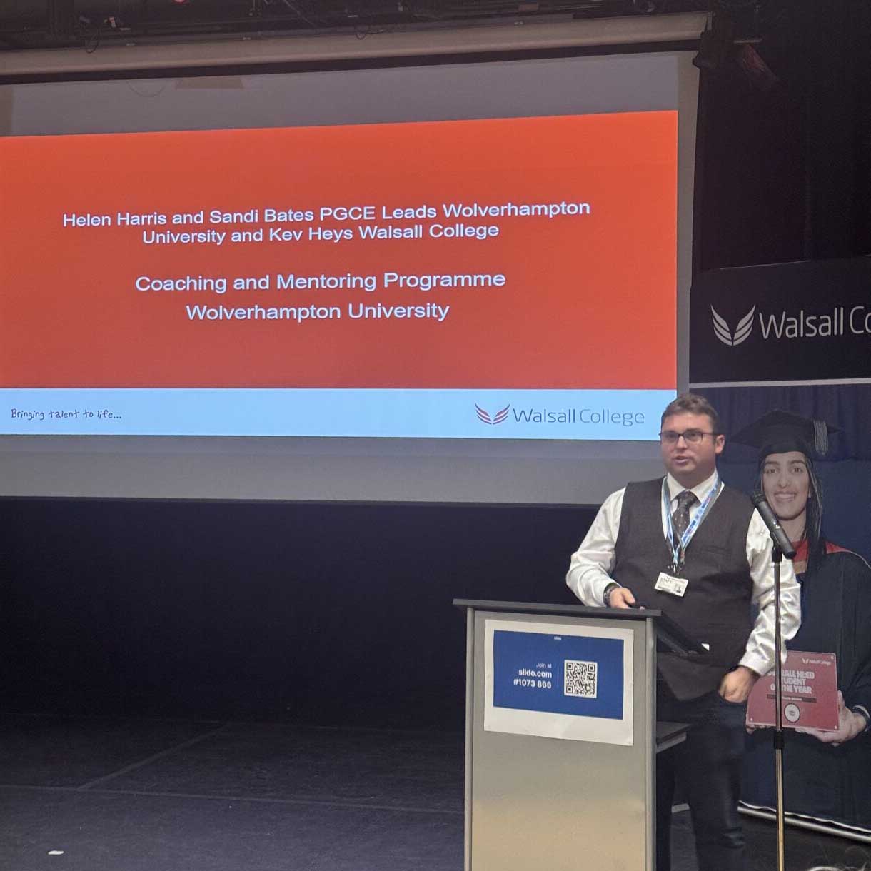 male speaker addressing audience