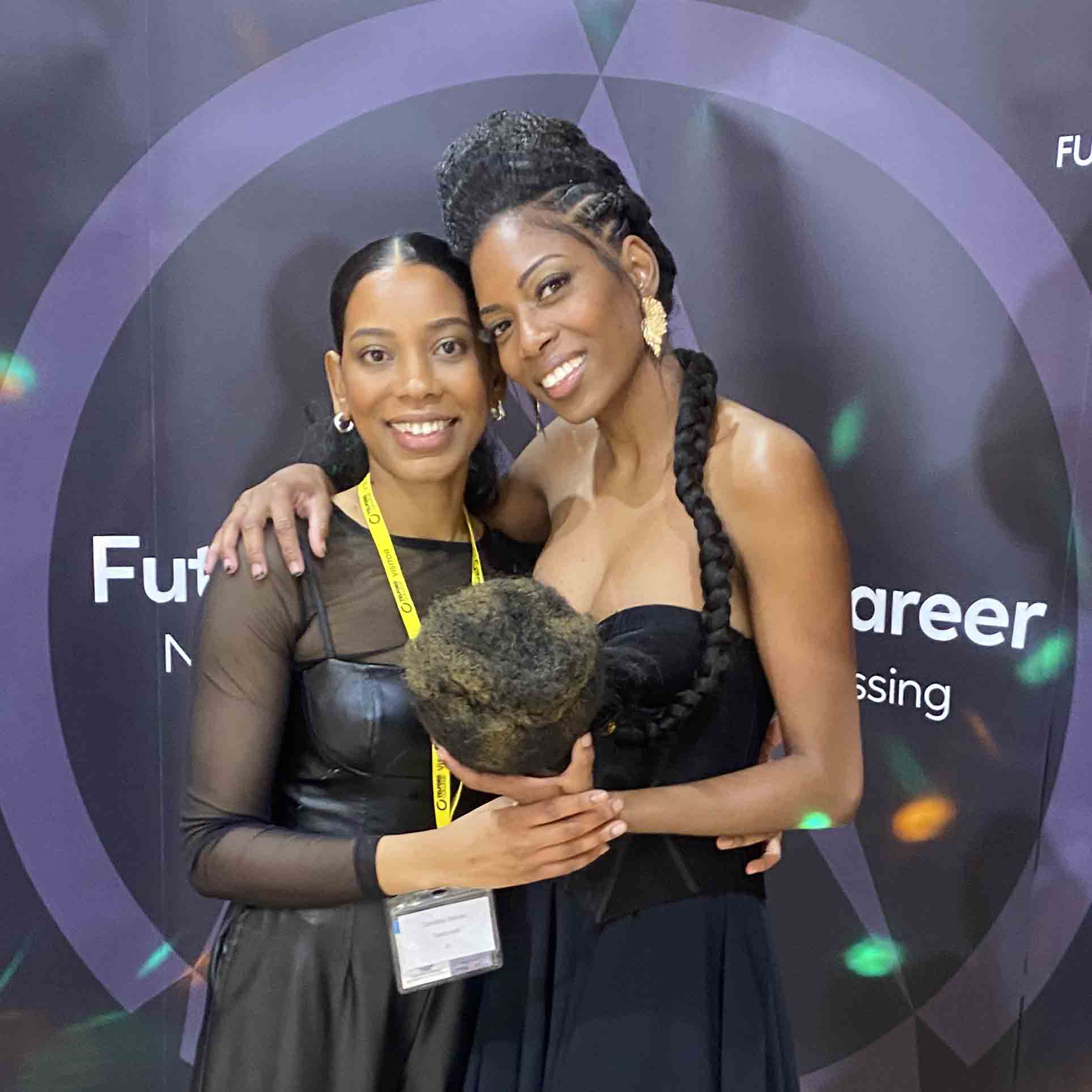 Female hairdresser posing with her model