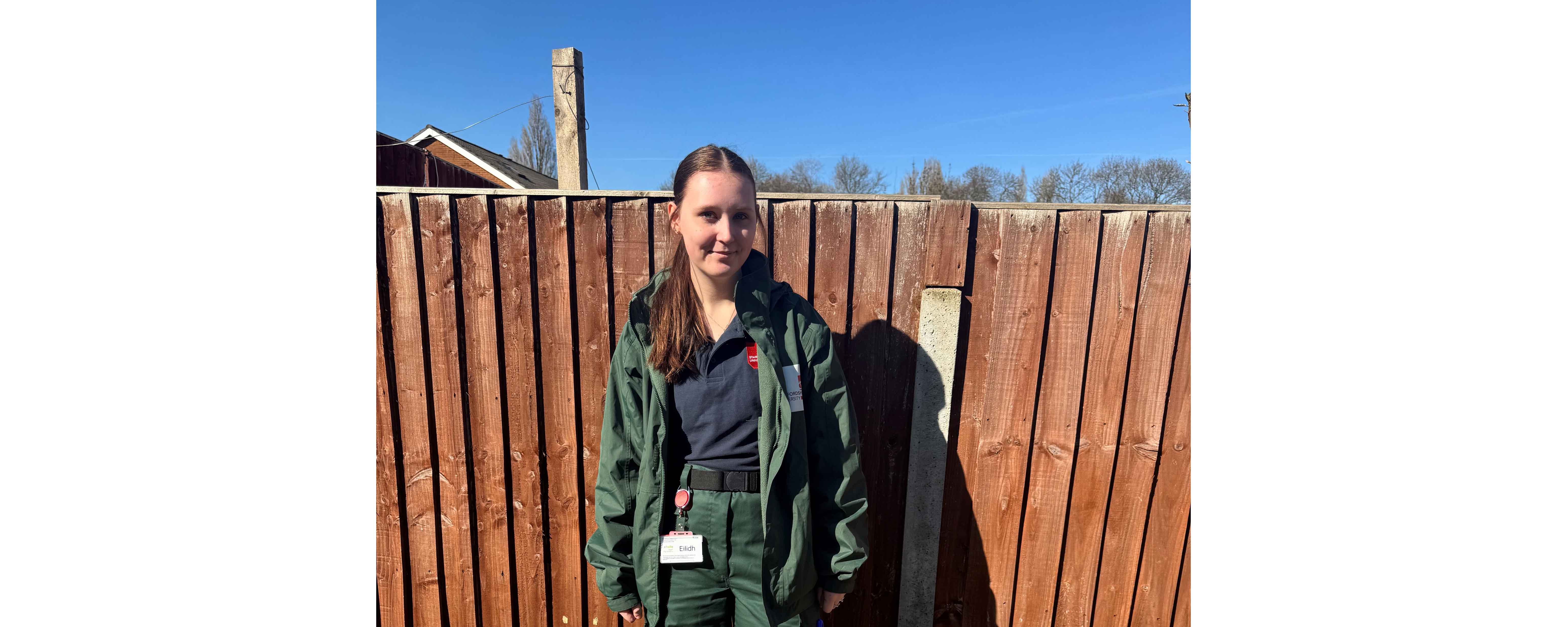 female in trainee paramedic uniform facing